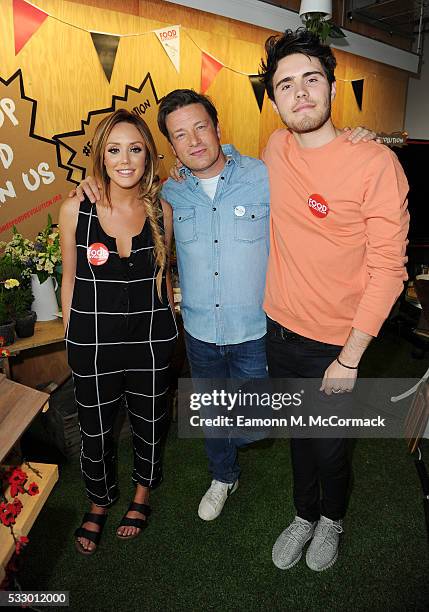 Charlotte Crosby, Jamie Oliver and Alfie Deyes take part in Jamie Oliver's Food Revolution Day on May 20, 2016 in London, United Kingdom. Jamie...