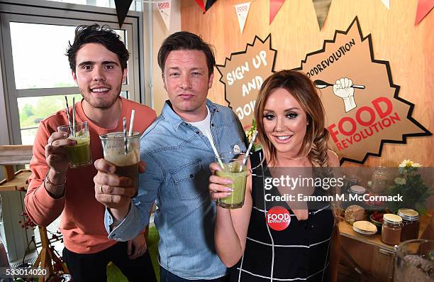 Alfie Deyes, Jamie Oliver and Charlotte Crosby take part in Jamie Oliver's Food Revolution Day on May 20, 2016 in London, United Kingdom. Jamie...