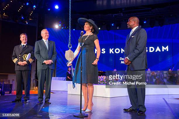 Captain Emiel de Vries, Stein Kruse, CEO Holland America Group and Orlando Ashford, President Holland America Line watch Queen Maxima of The...