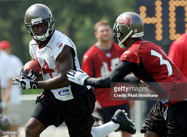 Carnell Williams of the Tampa Bay Buccaneers works out during training camp at Disney's Wide World of Sports Complex July 29 in Lake Buena Vista,...
