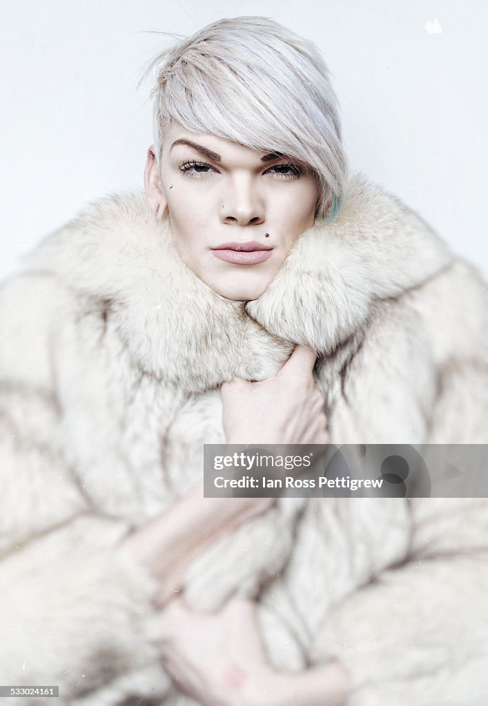 Gay/Trans man in fur coat