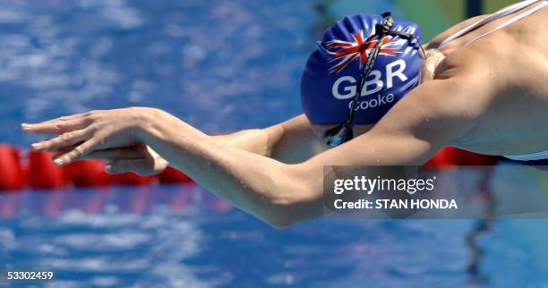 Rebecca Cooke of Great Britain dives into the pool at the start of a heat in the Women's 800M Freestyle 29 July, 2005 at the XI FINA Swimming World...