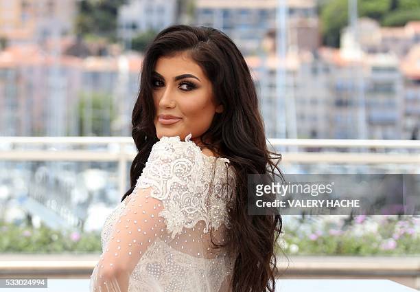 Kurdish singer Helly Luv poses on May 20, 2016 during a photocall for the film "Peshmerga" at the 69th Cannes Film Festival in Cannes, southern...