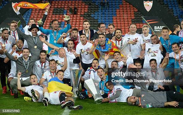 Sevilla players celebrate with the trophy after the UEFA Europa League Final match between Liverpool and Sevilla at St. Jakob-Park on May 18, 2016 in...