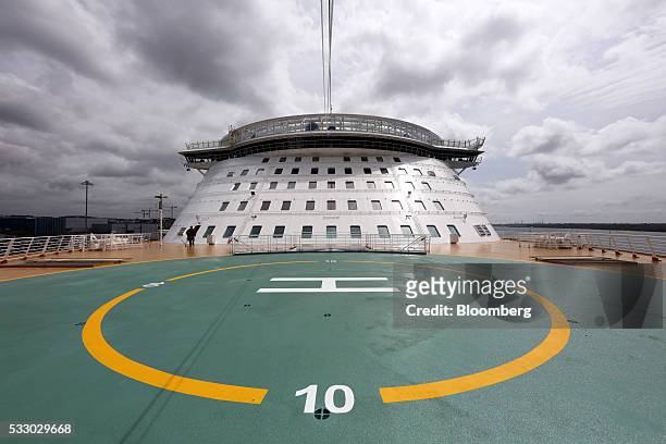 The helipad stands at the bow of the Royal Caribbean Cruise Ltd.'s Harmony of the Seas Oasis-class cruise ship docked in Southampton, U.K., on...
