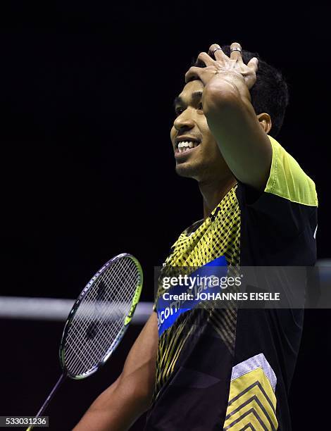 Iskandar Zulkarnain Zainuddin of Malaysia reacts after a point against Hans-Kristian Vittinghus of Denmark during their men's semi finals singles...