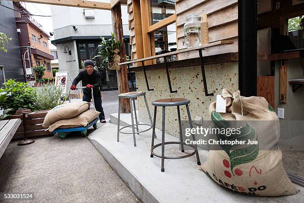 Coffee beans are seen being delivered to specialty coffee shop Onibus Coffee on May 20, 2016 in Tokyo, Japan. With the rise of specialty coffee shops...