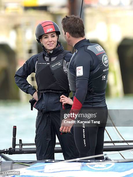 Catherine, Duchess of Cambridge and Sir Ben AInslie onboard the Land Rover BAR training boat on May 20, 2016 in Portsmouth, England.