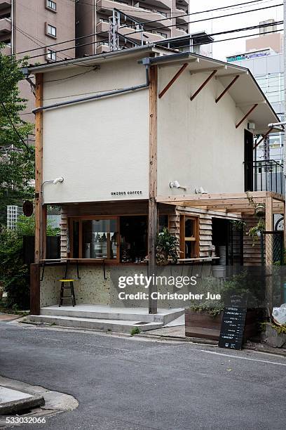 View of specialty coffee shop Onibus Coffee on May 20, 2016 in Tokyo, Japan. The Onibus Coffee building was originally a old traditional Japanese...