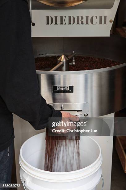 Roasted coffee beans is seen being prepared at specialty coffee shop Onibus Coffee on May 20, 2016 in Tokyo, Japan. With the rise of specialty coffee...