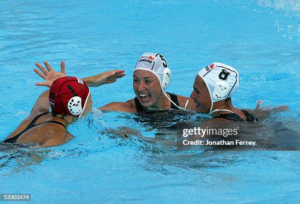 Goalkeeper Patricia Horvath, Mercedes Stieber and Krisztina Zantleitner of Hungary celebrate after defeating the United States in the gold medal...