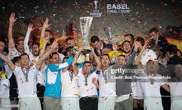 Jose Antonio Reyes and the Sevilla team celebrate with the trophy after victory in the UEFA Europa League Final match between Liverpool and Sevilla...