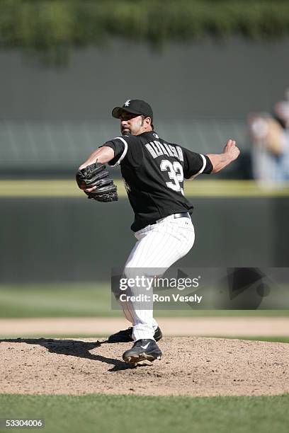 Dustin Hermanson of the Chicago White Sox delivers a pitch during the game against the Oakland Athletics at U.S. Cellular Field on July 10, 2005 in...