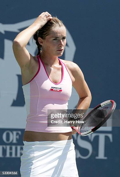 Iveta Benesova of the Czech Republic reacts to her play in a 2-6, 1-6 loss to Patty Schnyder of Switzerland during the Bank of the West Classic...