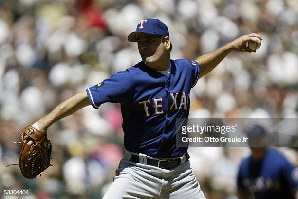 Kenny Rogers of the Texas Rangers pitches against the Seattle Mariners during the game on July 3, 2005 at Safeco Field in Seattle, Washington. The...