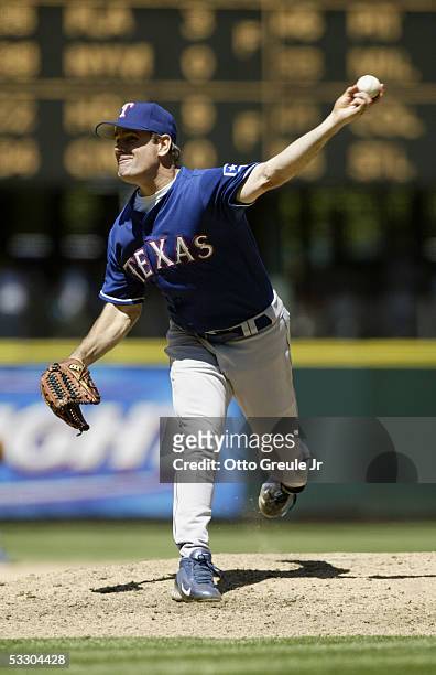Kenny Rogers of the Texas Rangers pitches against the Seattle Mariners during the game on July 3, 2005 at Safeco Field in Seattle, Washington. The...
