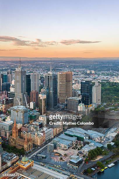 aerial of melbourne city at sunset, australia - federation square melbourne stock-fotos und bilder