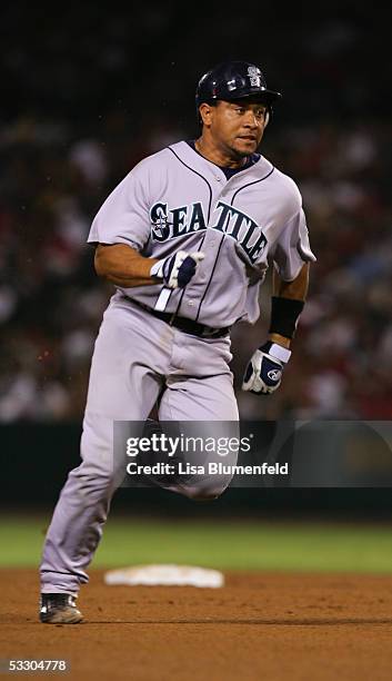 Miguel Olivo of the Seattle Mariners runs the bases against the Los Angeles Angels of Anaheim on July 9, 2005 at Angel Stadium in Anaheim, California.