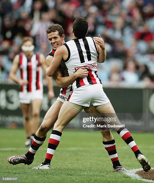 Luke Ball and Leigh Montagna for the Saints celebrate a goal during the AFL Round 18 match between the Melbourne Demons and the St Kilda Saints at...