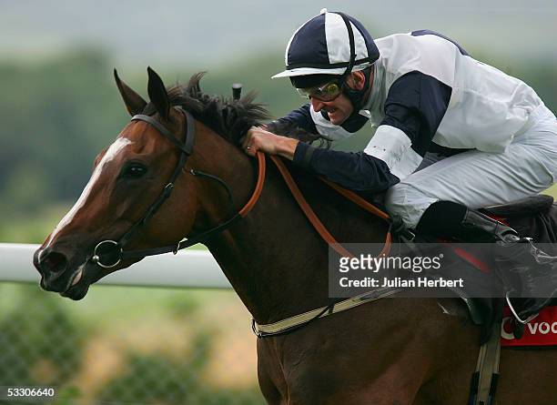 Kevin Manning and Alexander Goldrun land The Vodafone Nassau Stakes Race run at Goodwood Racecourse on July 30, 2005 in Goodwood, England.
