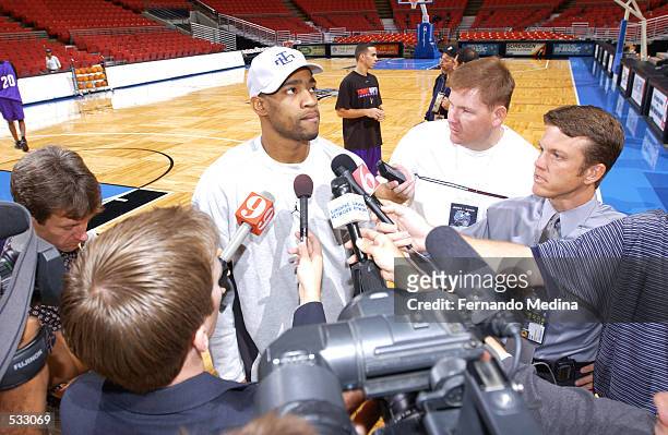 Vince Carter of the Toronto Raptors speaks with reporters prior to the NBA game against the Orlando Magic at the TD Waterhouse Centre in Orlando,...