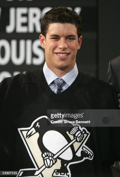 First overall draft pick Sidney Crosby of the Pittsburgh Penguins poses after being selected during the 2005 National Hockey League Draft on July 30,...
