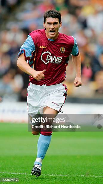 Gareth Barry of Villa in action during the pre-season friendly match between Wolverhampton Wanderers and Aston Villa at Molineux, July 30, 2005 in...