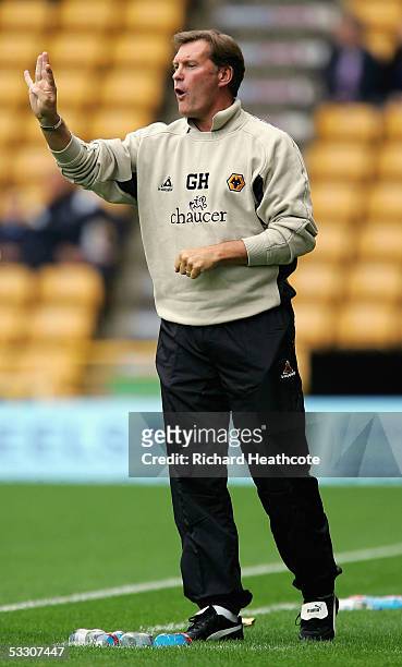 Glenn Hoddle the Wolves manager gives instructions during the pre-season friendly match between Wolverhampton Wanderers and Aston Villa at Molineux,...
