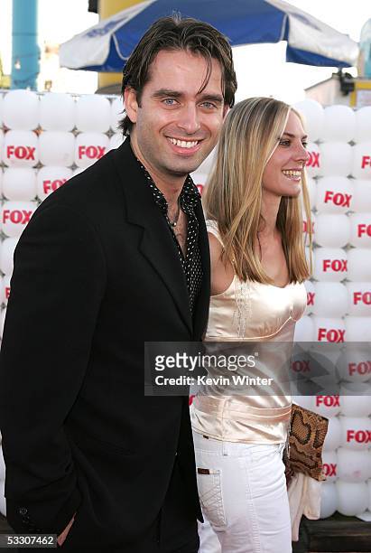 Actor Bruno Campos and guest arrives at Fox All-Star Television Critics Association party at Santa Monica Pier on July 29, 2005 in Santa Monica,...