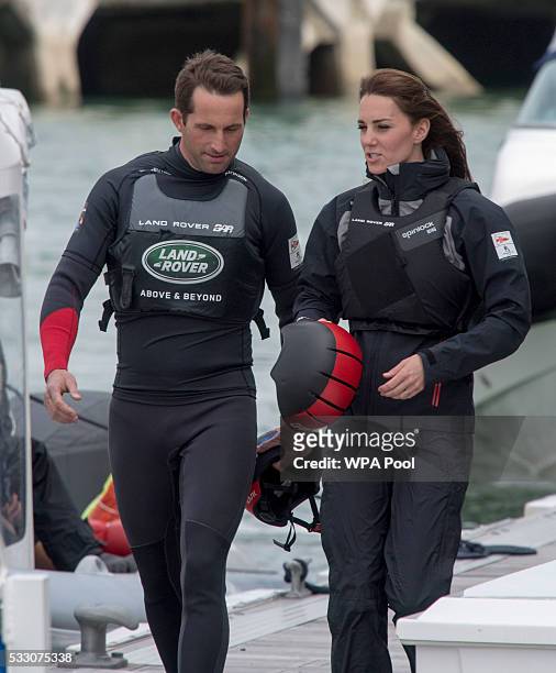 Catherine, Duchess of Cambridge, patron of the 1851 Trust, talks with Sir Ben Ainslie as she visits the Land Rover BAR team, who are challenging for...