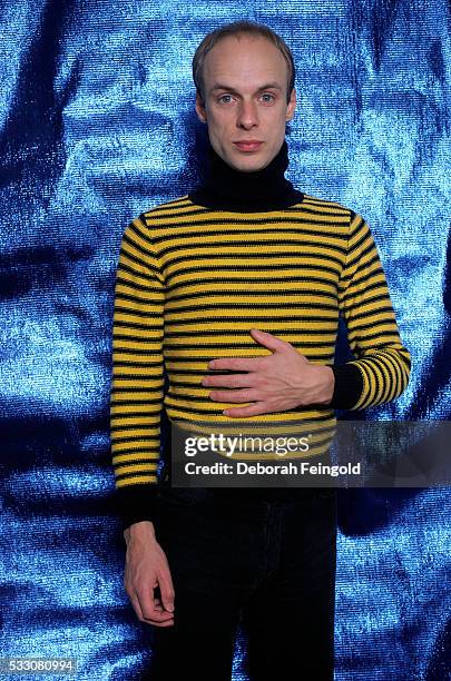 Deborah Feingold/Corbis via Getty Images) Musician Brian Eno in Striped Turtleneck