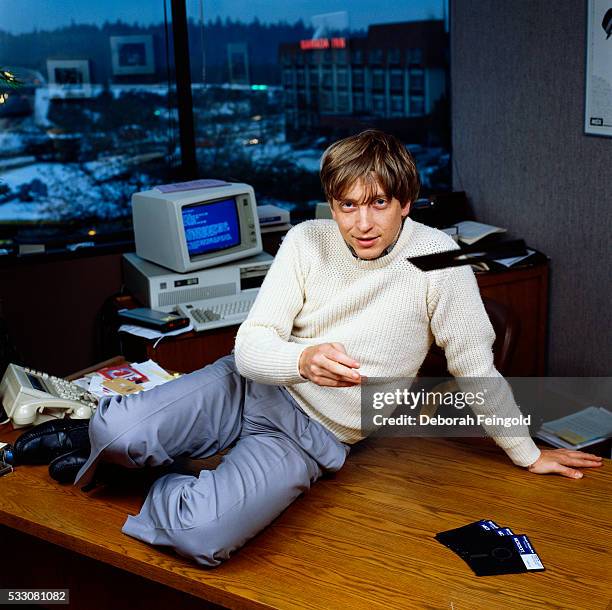 Deborah Feingold/Corbis via Getty Images) Bill Gates, CEO of Microsoft, throws a Windows 1.0 floppy disk in his office soon after the product's...