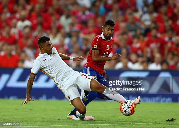 Emerson Palmieri of AS Roma compete for the ball with Moamen Zakaria Abbas of Al Ahli during the friendly match between AS Roma and Al Ahly on May...