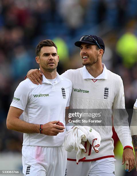 England bowler James Anderson is congratulated by Steven Finn after taking 5 wickets during day two of the 1st Investec Test match between England...