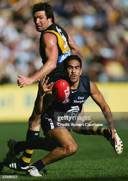 Eddis Betts of the Blues in action during the round 18 AFL match between the Carlton Blues and the Richmond Tigers at the Telstra Dome on July 31,...