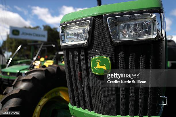The John Deere logo is displayed on a tractor at Belkorp Ag on May 20, 2016 in Santa Rosa, California .Illinois based Deere & Co. Reported a 28.25...