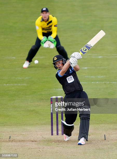 Phil Salt of Sussex Sharks scores runs as wicket keeper Craig Cachopa of Gloustershire looks on during the NatWest T20 Blast match between...