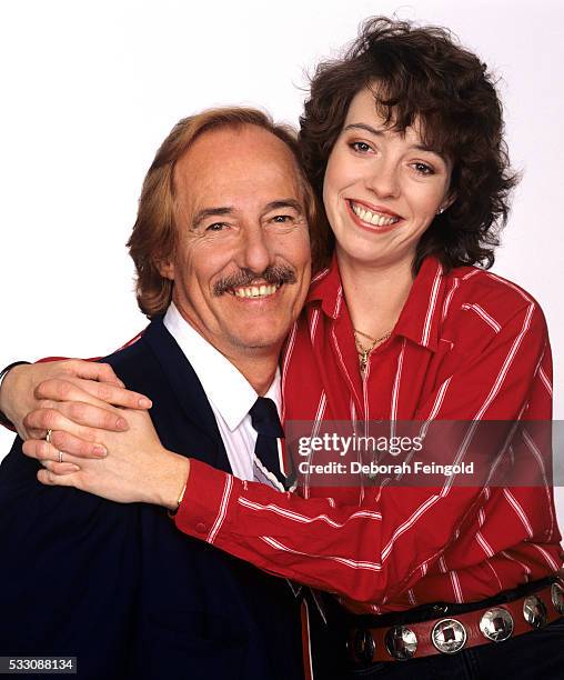 Deborah Feingold/Corbis via Getty Images) John and Mackenzie Phillips