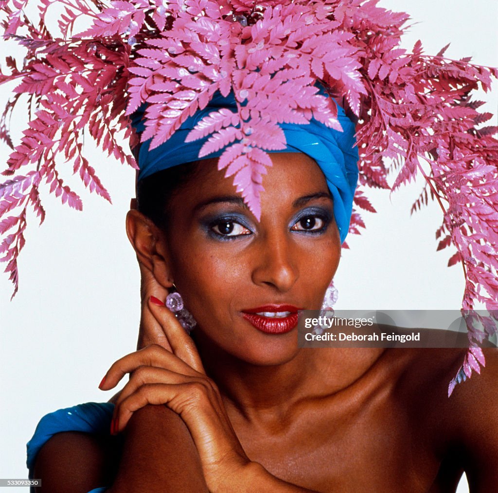 Pam Grier Wearing Artifical Pink Ferns