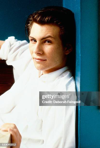 Deborah Feingold/Corbis via Getty Images) Actor Christian Slater in White Shirt