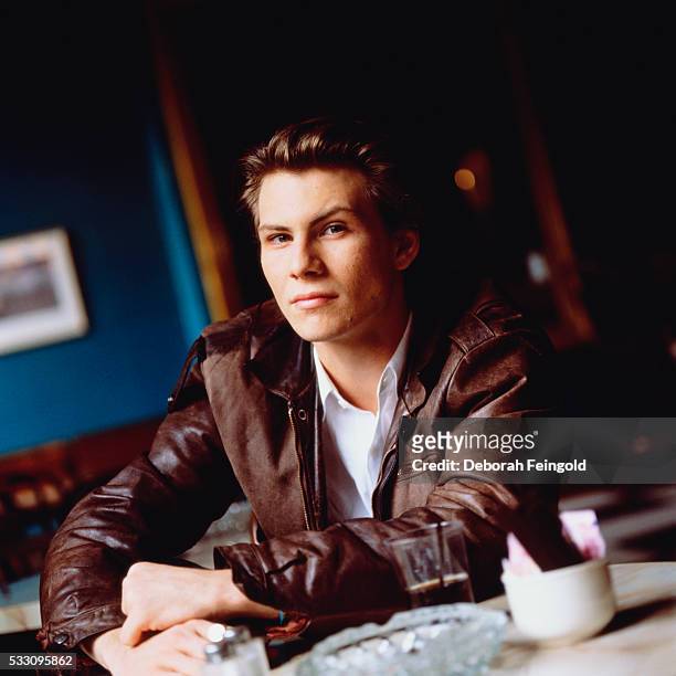 Deborah Feingold/Corbis via Getty Images) Actor Christian Slater in Brown Leather Jacket