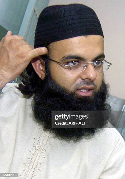 Mohammed Tahir, a 24-year-old Frenchman of Pakistani descent studying at Pakistan's religious school Jamia Ashrafia, speaks during an interview with...