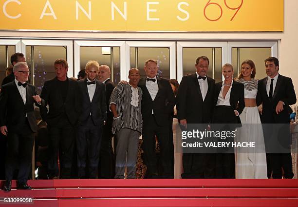 Festival General Delegate Thierry Fremaux escorts US actor and director Sean Penn, his son US actor Hopper Penn, US actor Zubin Cooper, British actor...