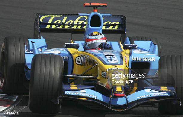 Renault Spanish driver Fernando Alonso steers his car on the Hungaroring racetrack during the Hungarish Grand Prix, 31 July 2005 in Budapest,...