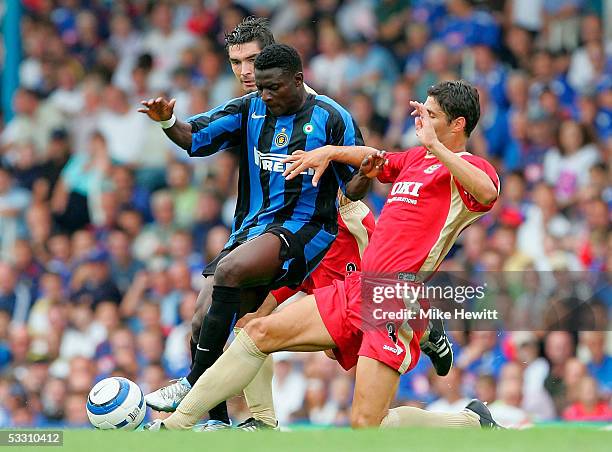 Obafemi Martins of Inter battles with Dejan Stefanovic of Portsmouth during the pre-season friendly between Portsmouth and Internazionale on July 31,...