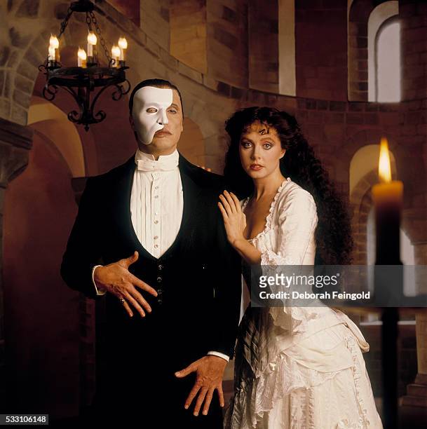 Deborah Feingold/Corbis via Getty Images) Michael Crawford and Sarah Brightman in costume for Phantom of the Opera.