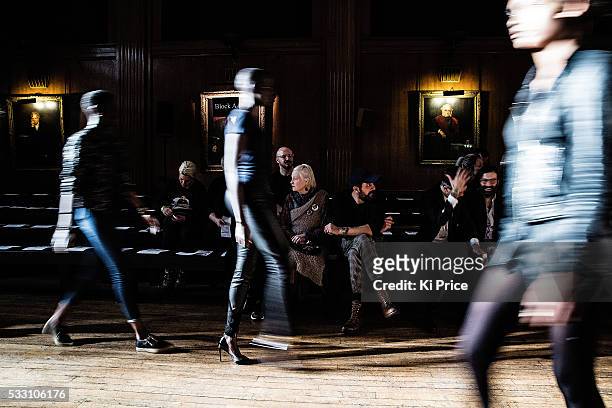 Vivienne Westwood and Andreas Kronthaler watch a run through at AW16 catwalk on day 3 of London Fashion week on 21st February 2016.