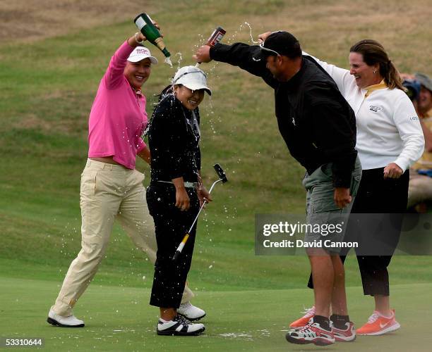 Jeong Jang of Korea is covered in champagne by her friends after she had sunk the winning putt on the 18th hole during the final round of the...