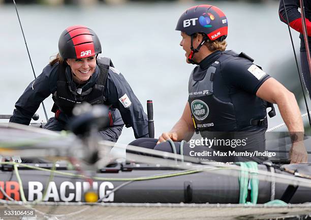 Catherine, Duchess of Cambridge on board a Land Rover BAR team training catamaran during a training circuit on the Solent on May 20, 2016 in...