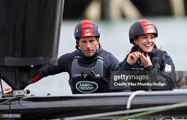 Sir Ben Ainslie and Catherine, Duchess of Cambridge on board a Land Rover BAR team training catamaran as they run a training circuit on the Solent on...